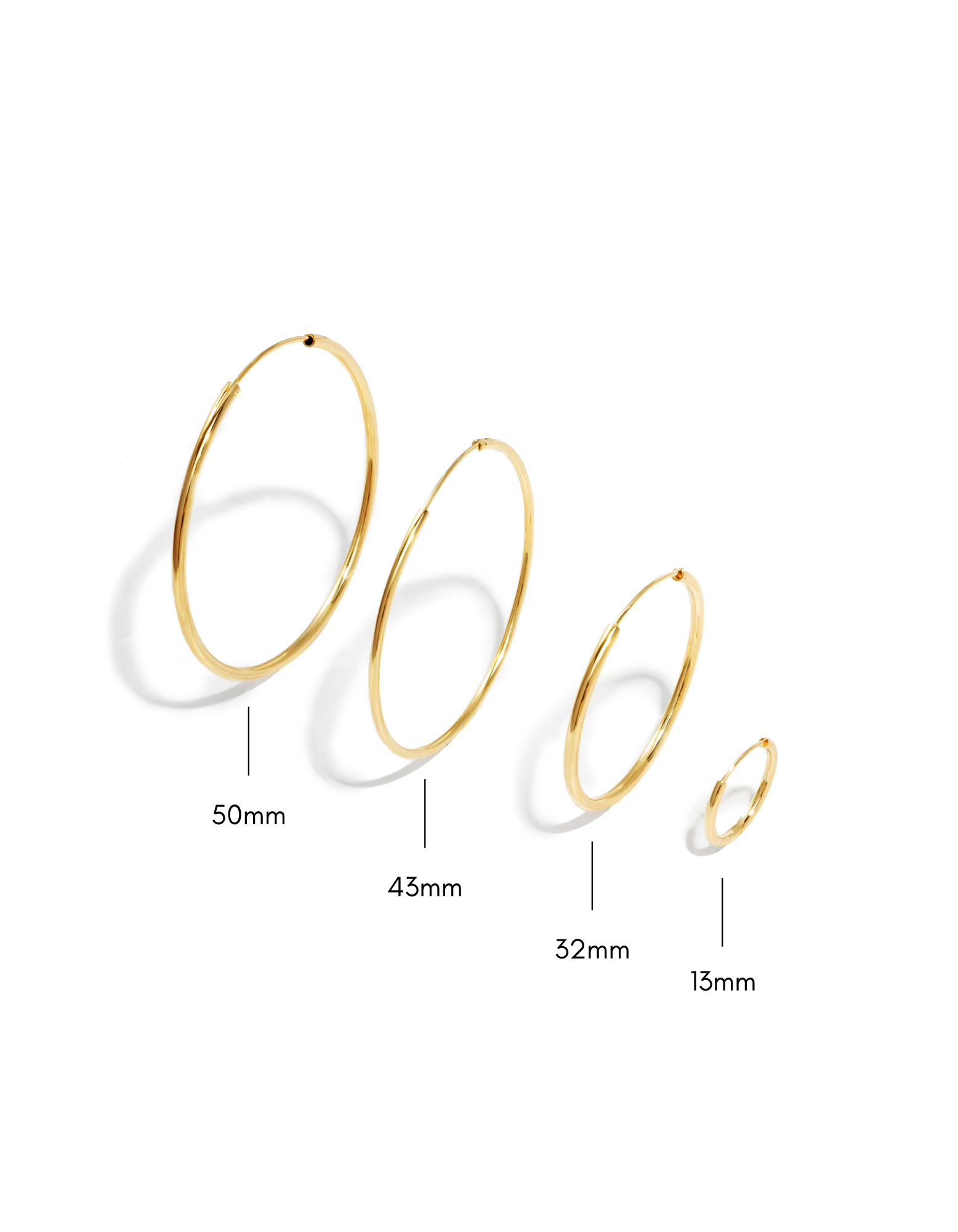 infinity hoop earrings in gold in different size variants
