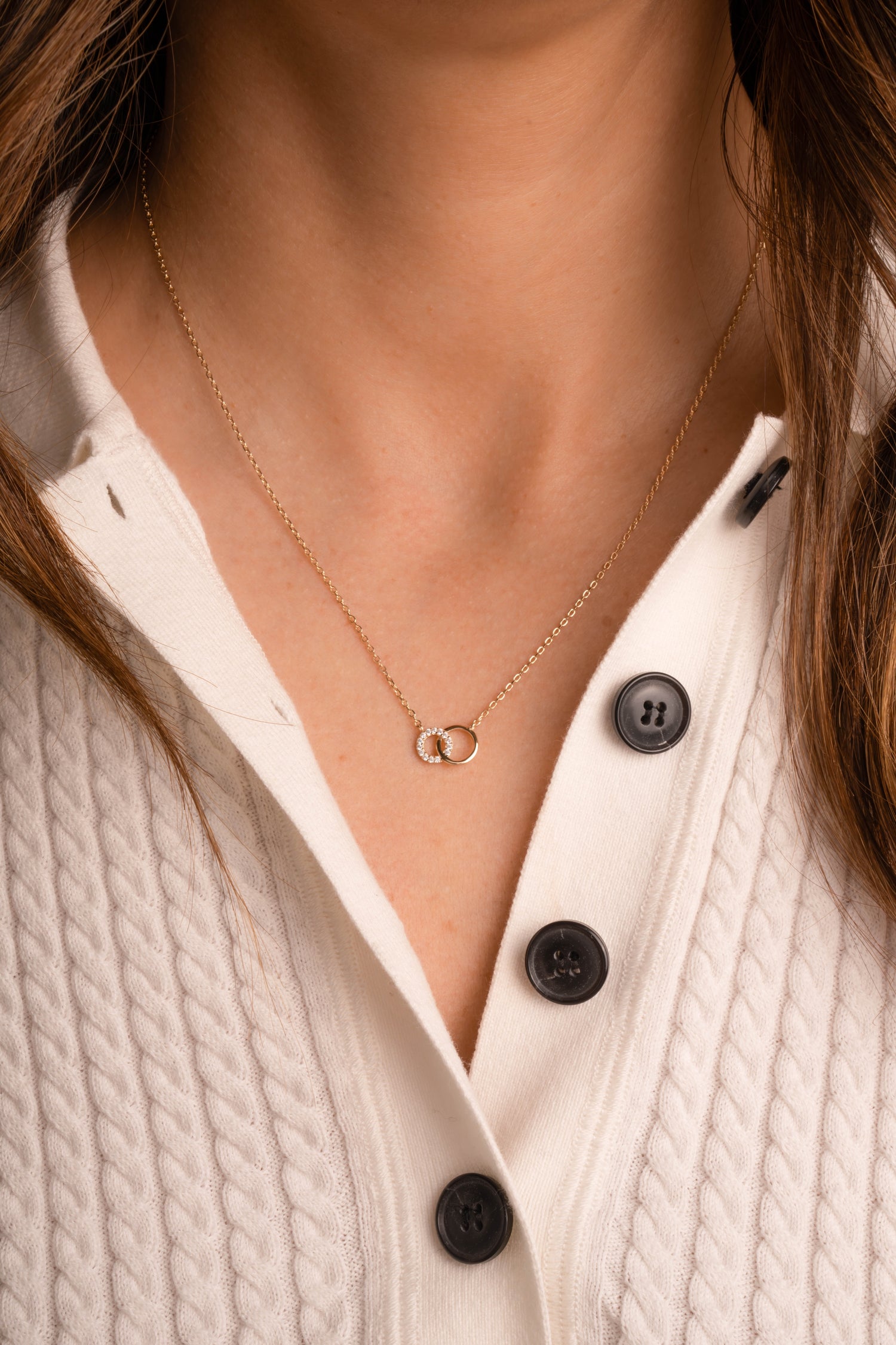 Gold Sami Jewels Circle Link Necklace with interlocking circular links worn by a model.