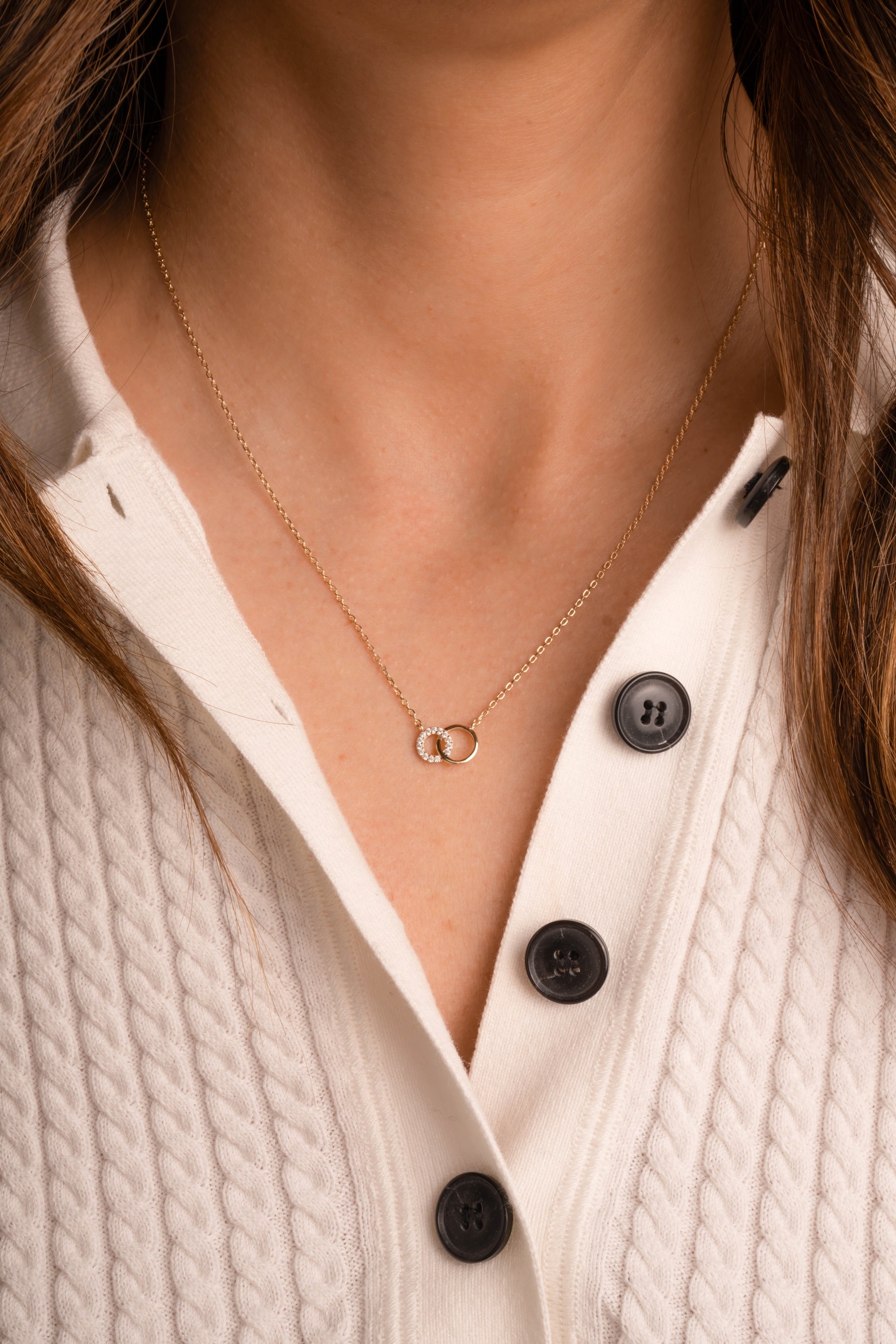 Gold Sami Jewels Circle Link Necklace with interlocking circular links worn by a model.