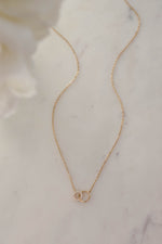 Gold Circle Link Necklace by Sami Jewels featuring interlocking circular links, elegant jewelry for everyday wear.
