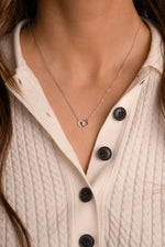 Sterling silver Circle Link Necklace by Sami Jewels featuring interlocking circular links on a model.