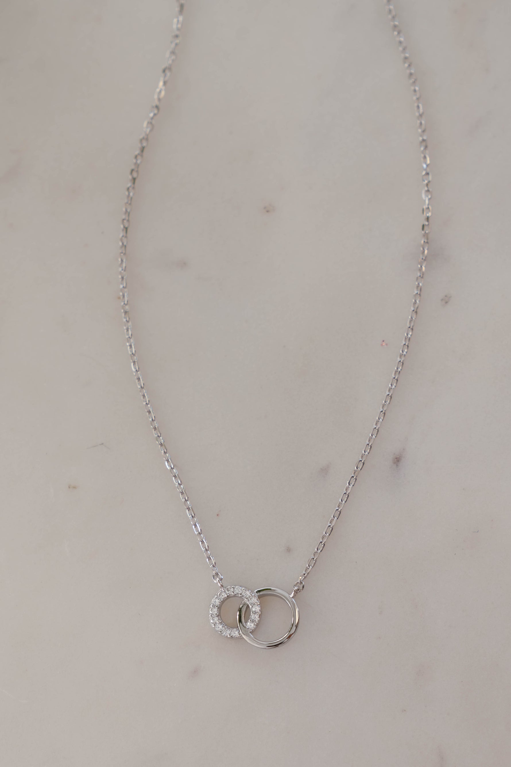 Sterling silver Circle Link Necklace by Sami Jewels featuring interlocking circular links.