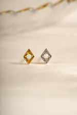 Kite-shaped opal stud earrings by Sami Jewels featuring gold and sterling silver settings.