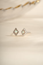 Kite-shaped opal stud earrings by Sami Jewels featuring sterling silver posts and vibrant opal gemstones.
