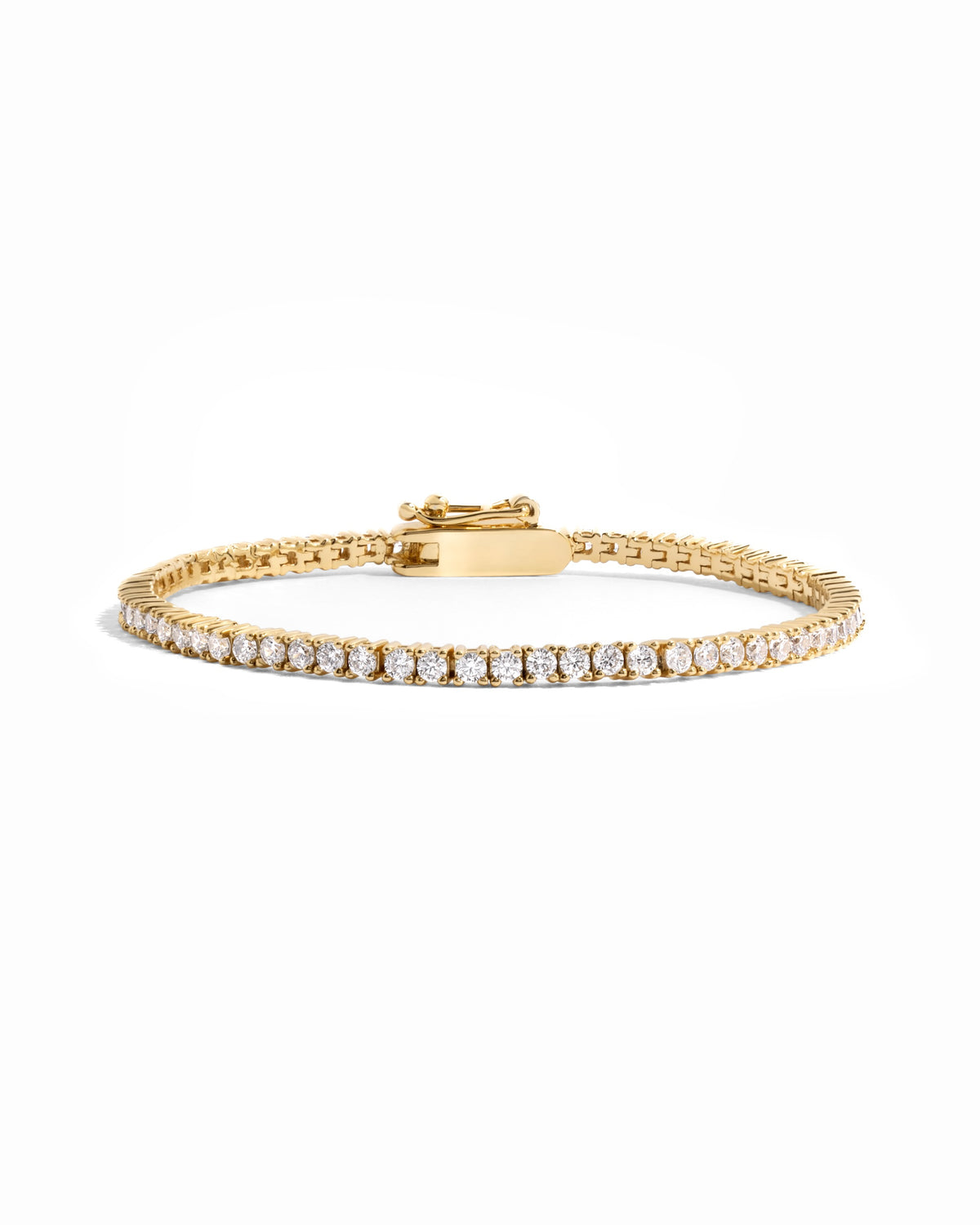 Lab-grown diamond tennis bracelet in gold vermeil on a white background