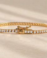 Lab-grown diamond tennis bracelet showing the box clasp with safety latch