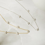 Dainty gold and silver plated diamond floral necklaces. Diamond Flower Necklace in 14k gold plated finish with floral pendant design.