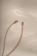 Rose gold Lightning Bolt Necklace by Sami Jewels with lobster clasp closure, featuring a sleek lightning bolt pendant.