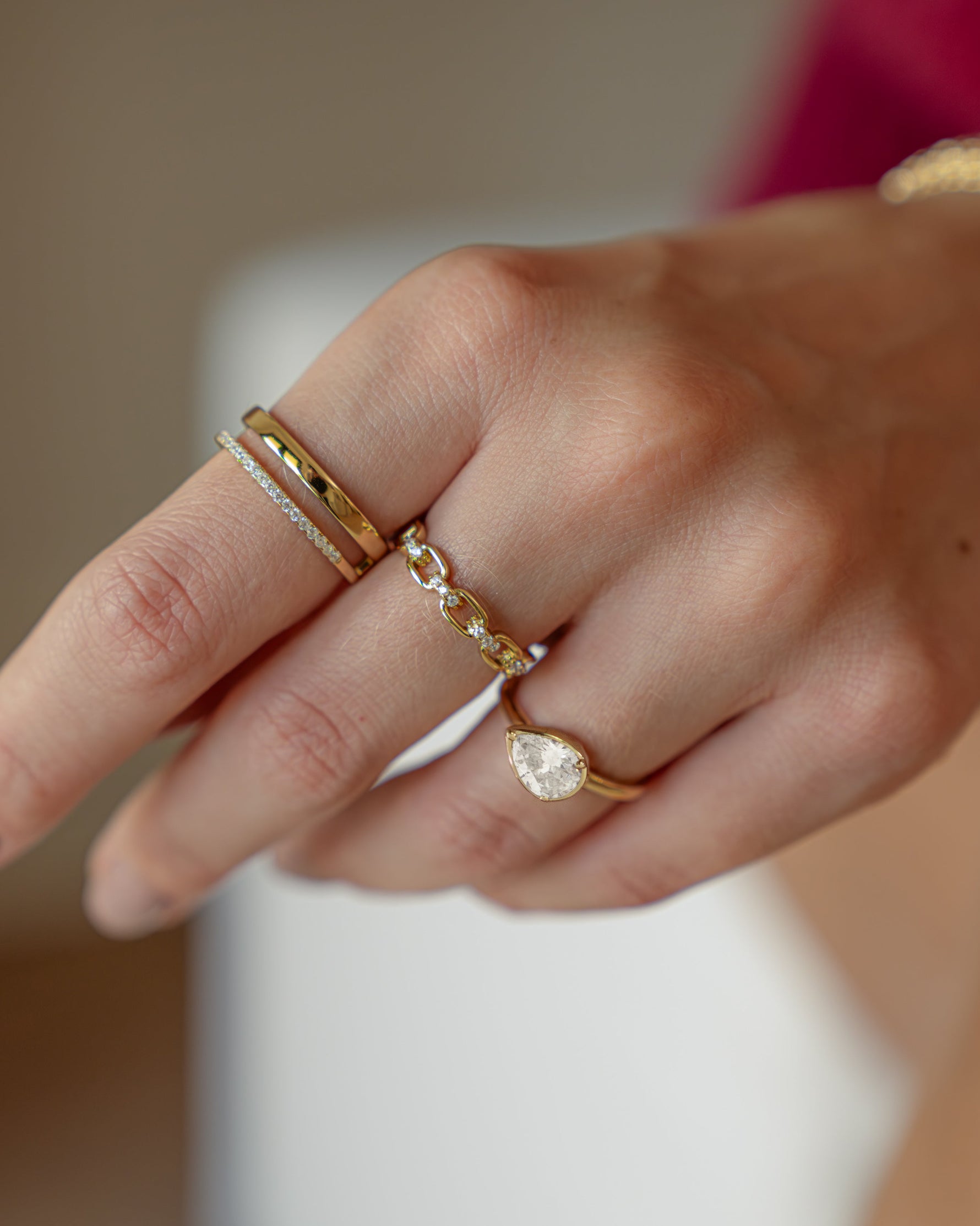 link chain ring in gold ring stack on model