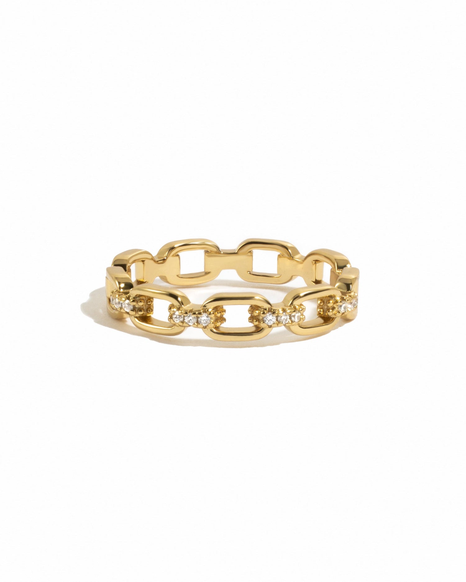 Gold link chain ring from Sami Jewels featuring a sleek, interconnected design on a white background.