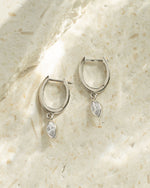 Sterling silver Marquise Bezel Drop Huggies earrings with elegant marquise-shaped design and bezel setting from Sami Jewels.