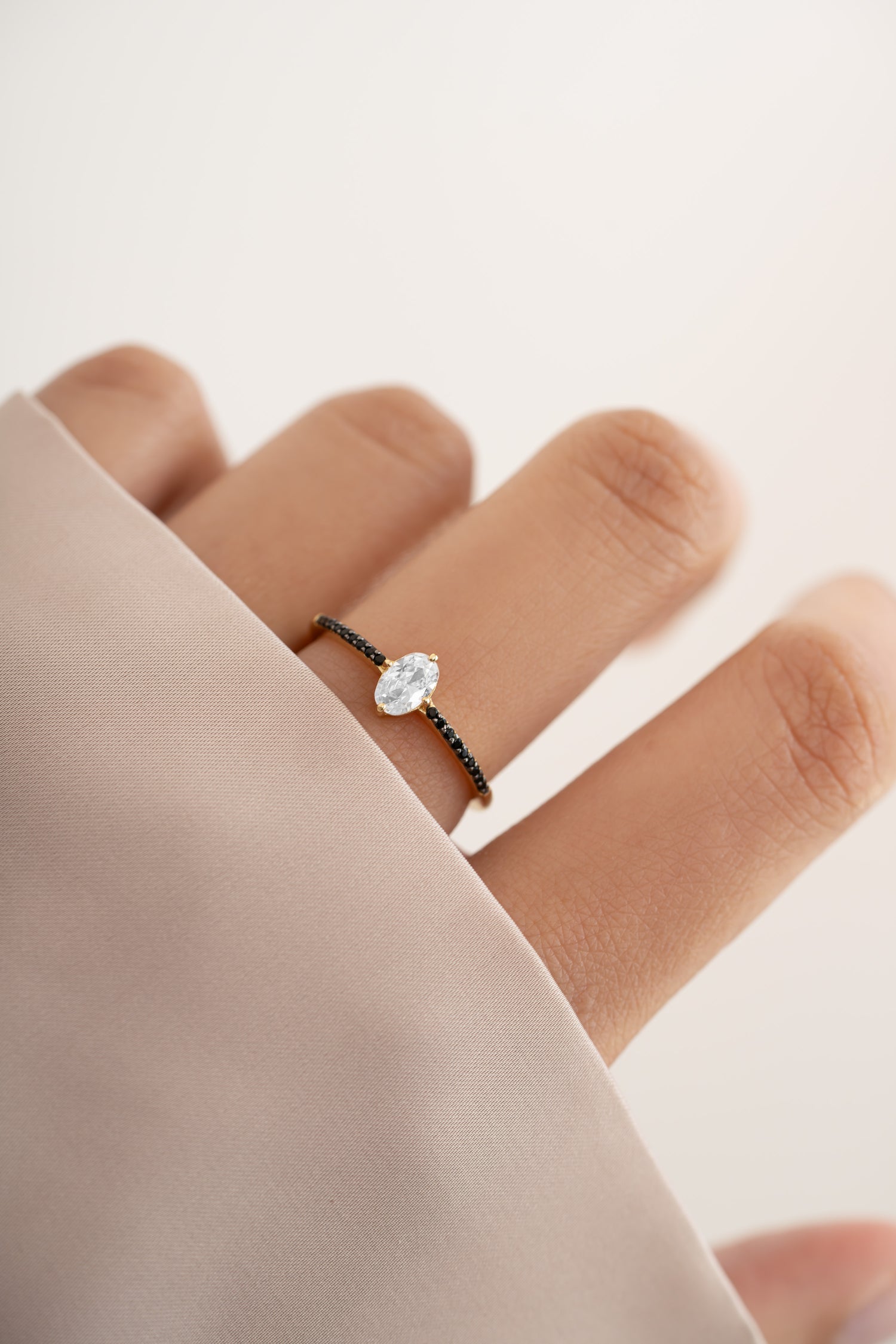 Gold Black CZ Maddy II Ring by Sami Jewels featuring marquise-cut black cubic zirconia and pave band on a model.