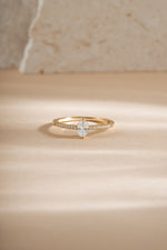 Gold Maddy Ring by Sami Jewels featuring a marquise-shaped CZ gemstone and pave band design.