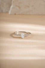 Sami Jewels Maddy Ring with marquise CZ stone and pave band in sterling silver, front view showing intricate design and sparkling details.