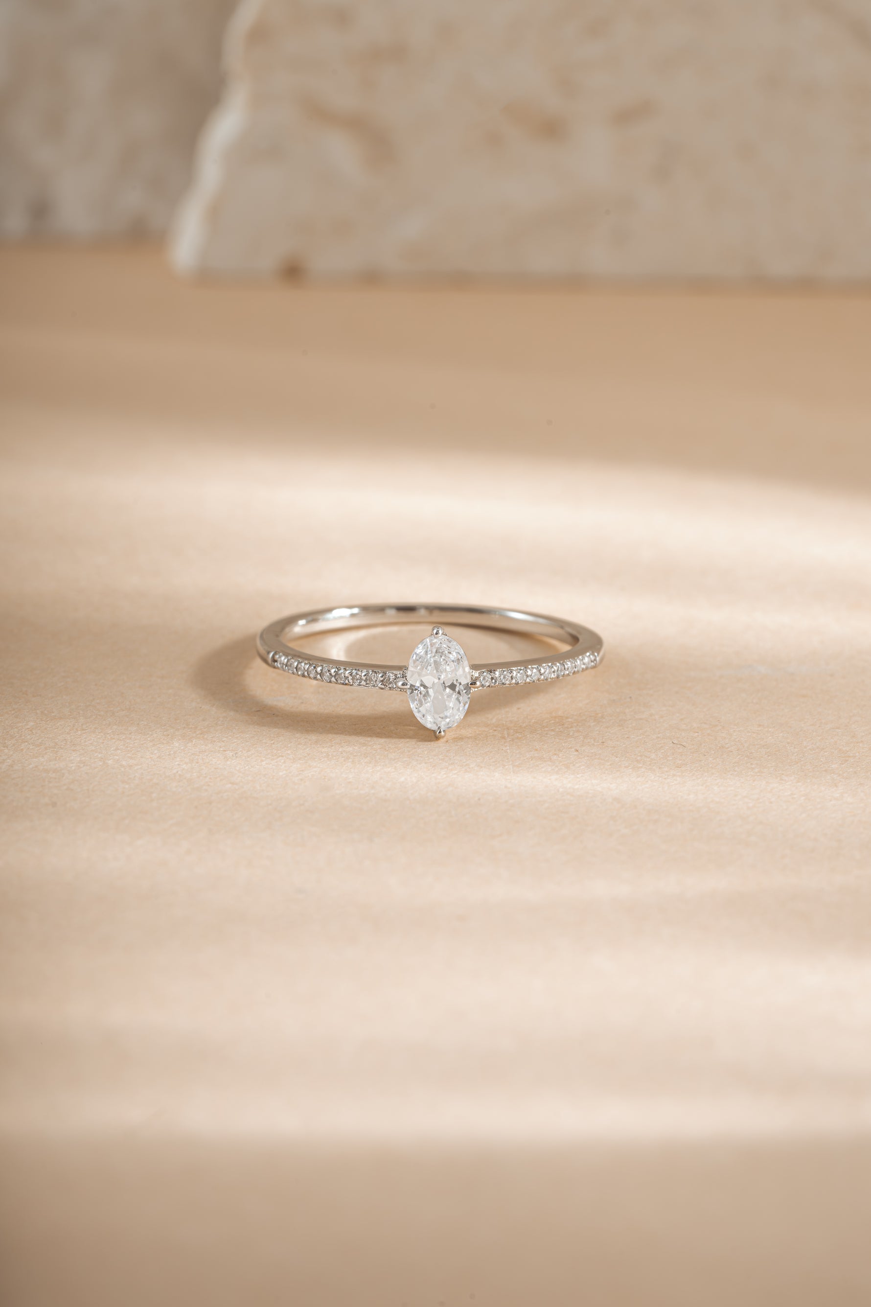 Sami Jewels Maddy Ring with marquise CZ stone and pave band in sterling silver, front view showing intricate design and sparkling details.