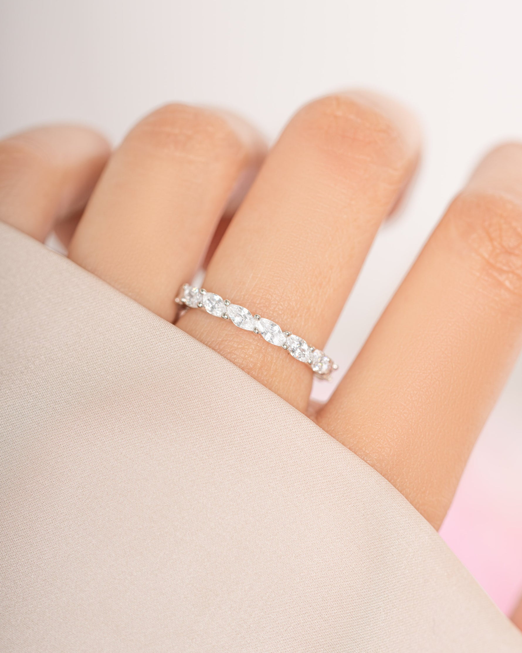 Sterling silver Marquise Eternity Ring by Sami Jewels featuring a continuous row of marquise-shaped stones in a sleek band.