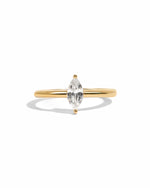 Gold Solitaire Marquise Ring by Sami Jewels featuring a prominent marquise-cut gemstone on a sleek band.