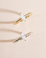 Sterling silver and gold solitaire marquise ring by Sami Jewels featuring a marquise-shaped gemstone.