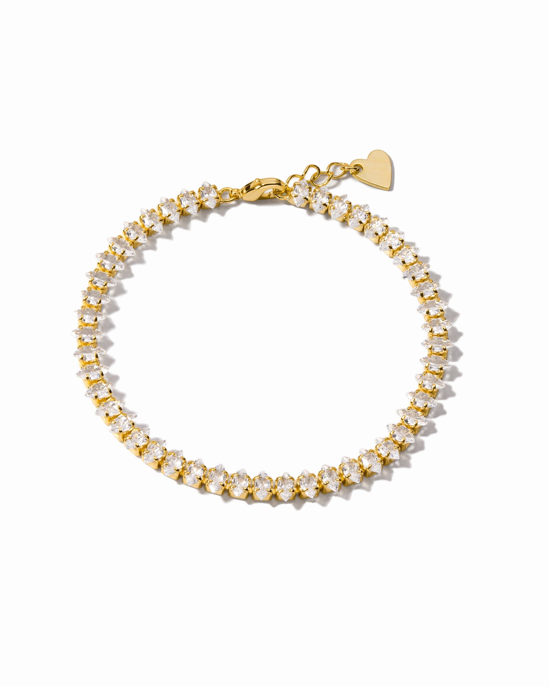 Gold Marquise Tennis Bracelet by Sami Jewels displayed on a white background, showcasing elegant marquise-shaped gemstones.