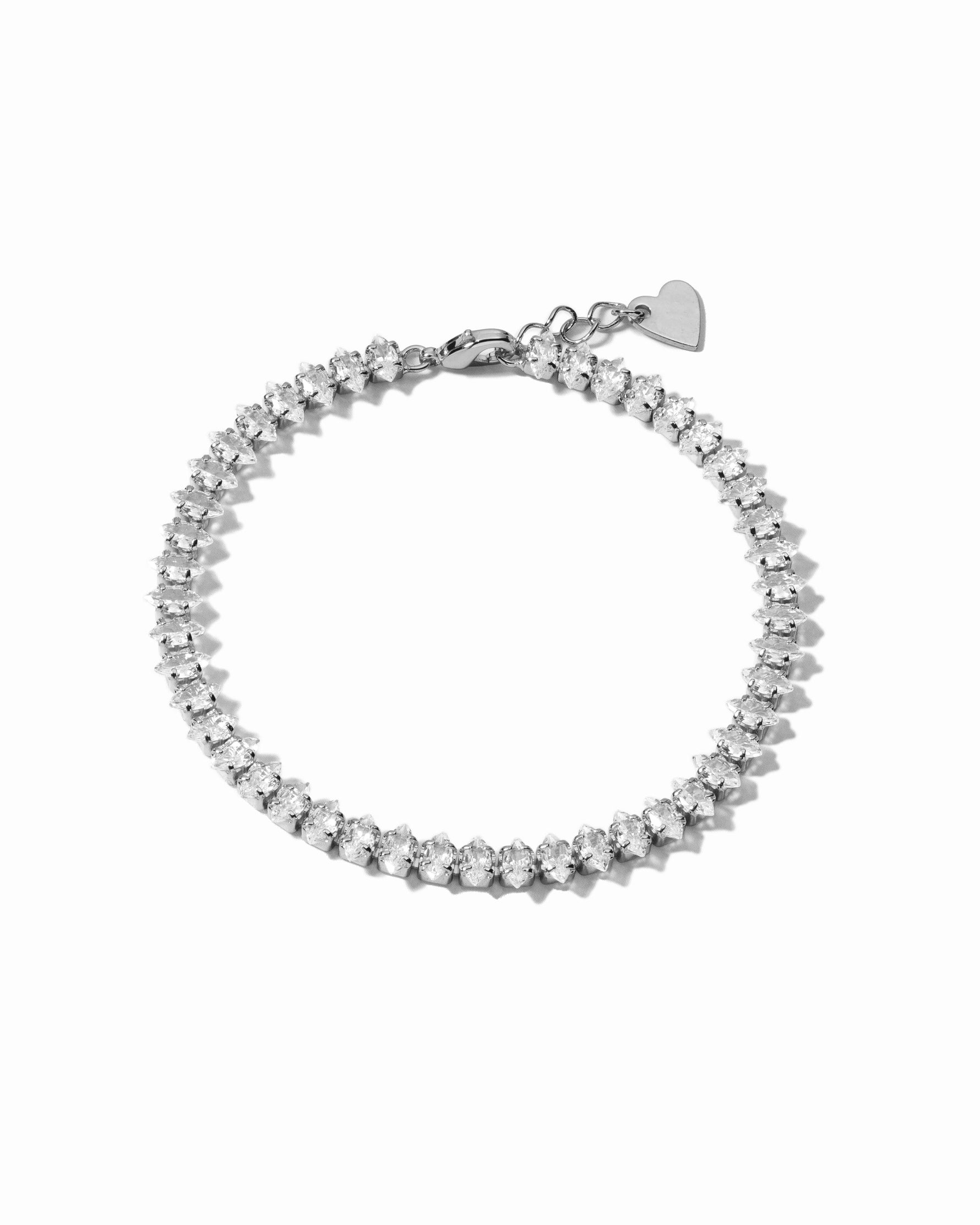 Silver Marquise Tennis Bracelet by Sami Jewels featuring a row of marquise-cut gemstones on a sleek bracelet.