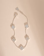 Silver MOP and diamond four-leaf clover bracelet by Sami Jewels with an adjustable chain, minimalist design.