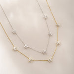Affordable Minimalist Diamond Flower Pendant Necklace available in gold and silver variations. 