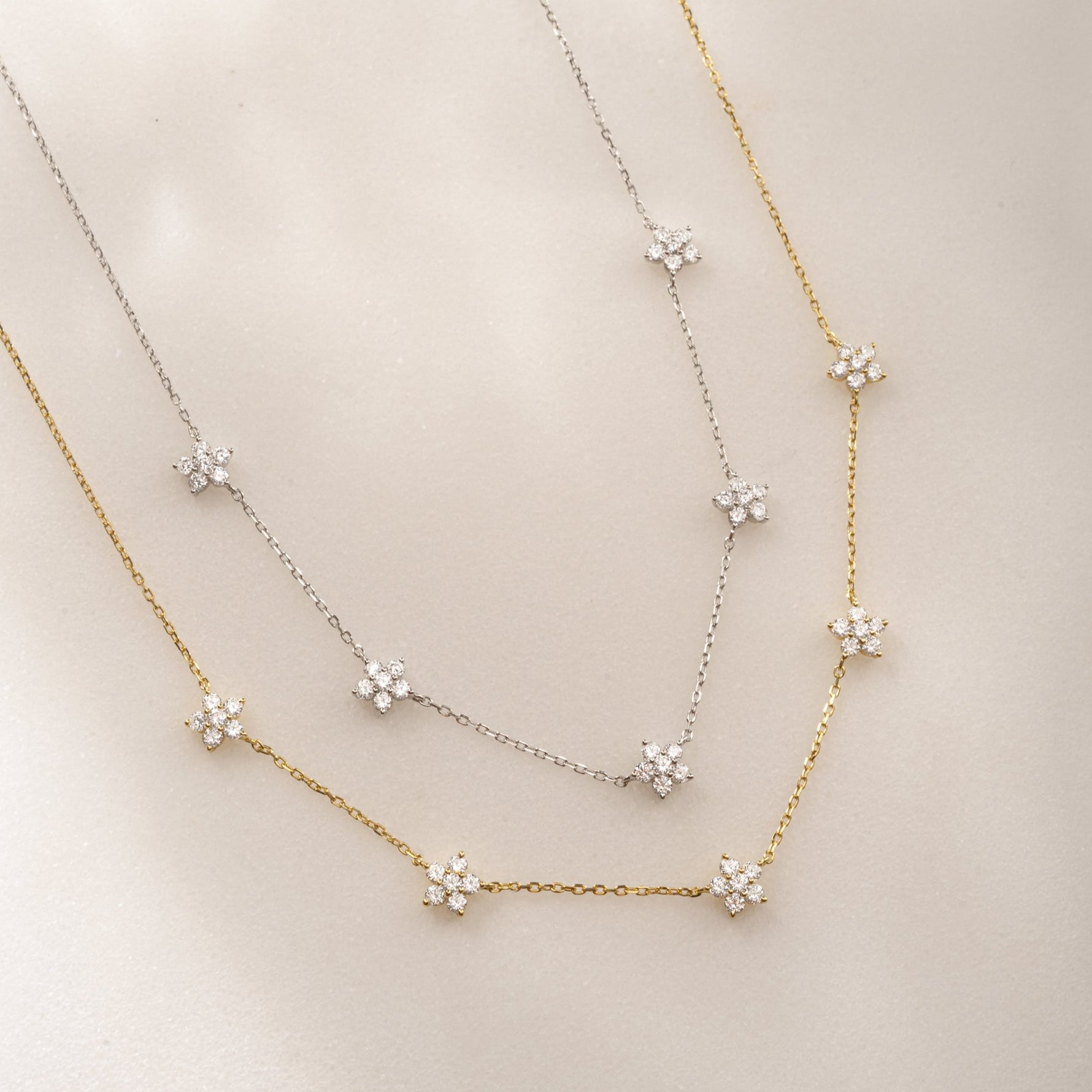 Affordable Minimalist Diamond Flower Pendant Necklace available in gold and silver variations. 