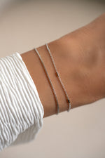 Sterling silver box chain bracelet set by Sami Jewels, minimalist design, shown stacked on wrist.
