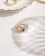 Mixed metal loop ring featuring gold and sterling silver, crafted by Sami Jewels, with a sleek, modern design.