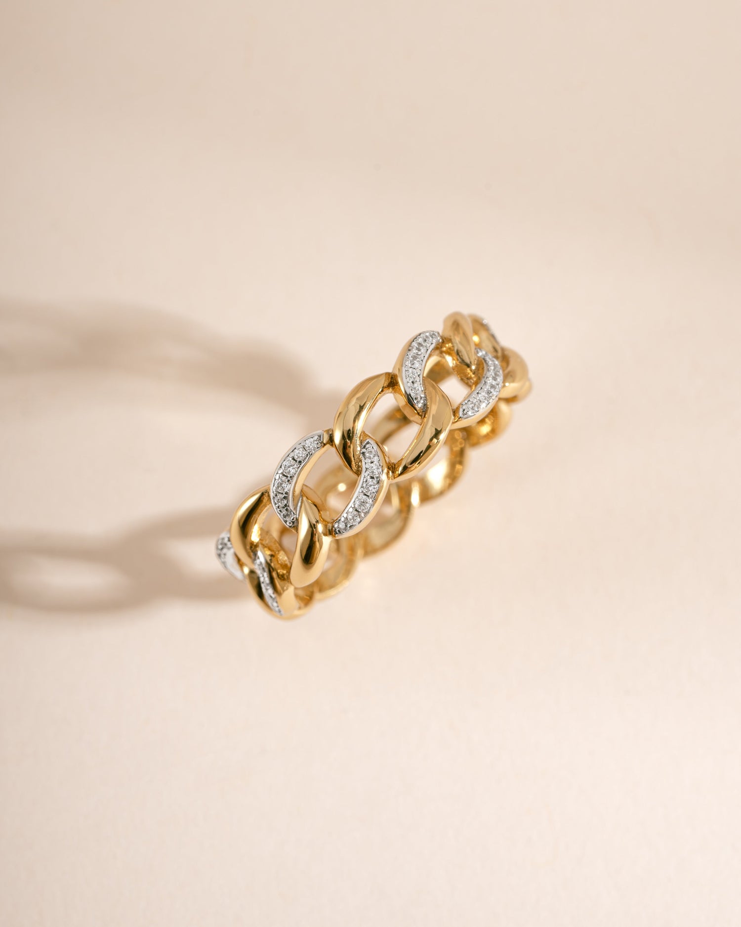 Mixed metal pavé chain ring from Sami Jewels featuring a stylish, contemporary design with intricate metal detailing.