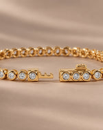 Moissanite round bezel tennis bracelet with the box clasp open