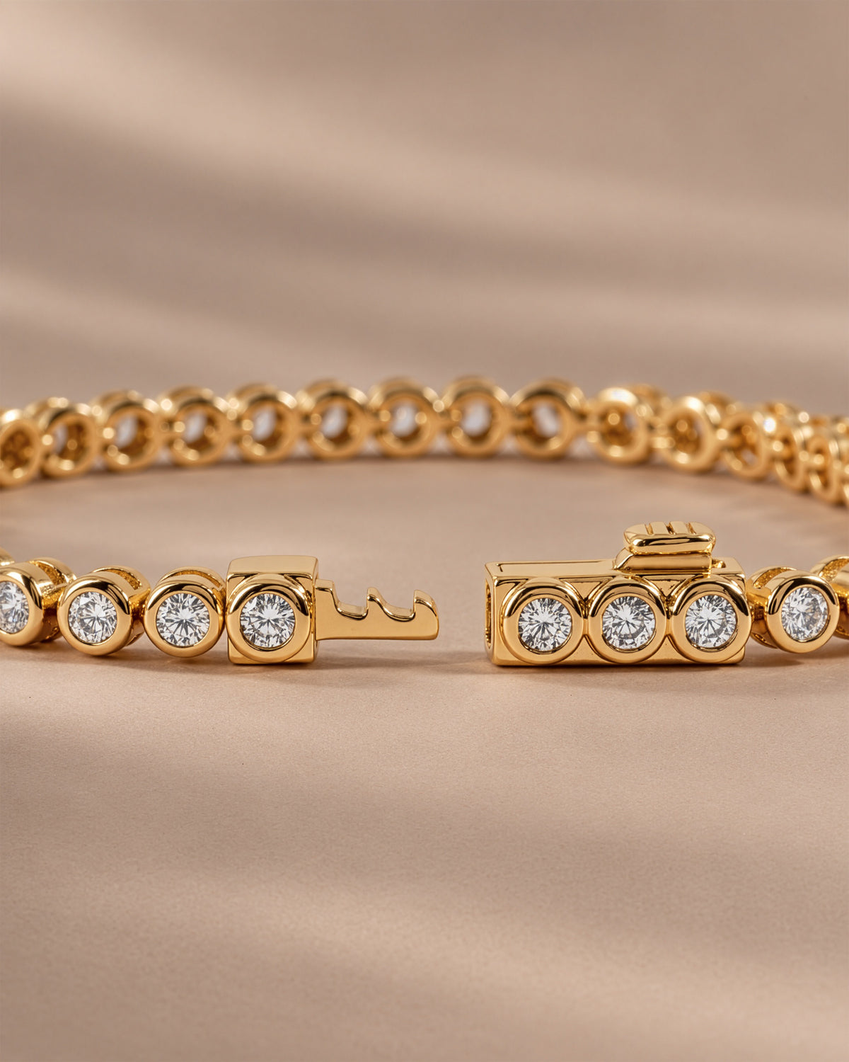 Moissanite round bezel tennis bracelet with the box clasp open