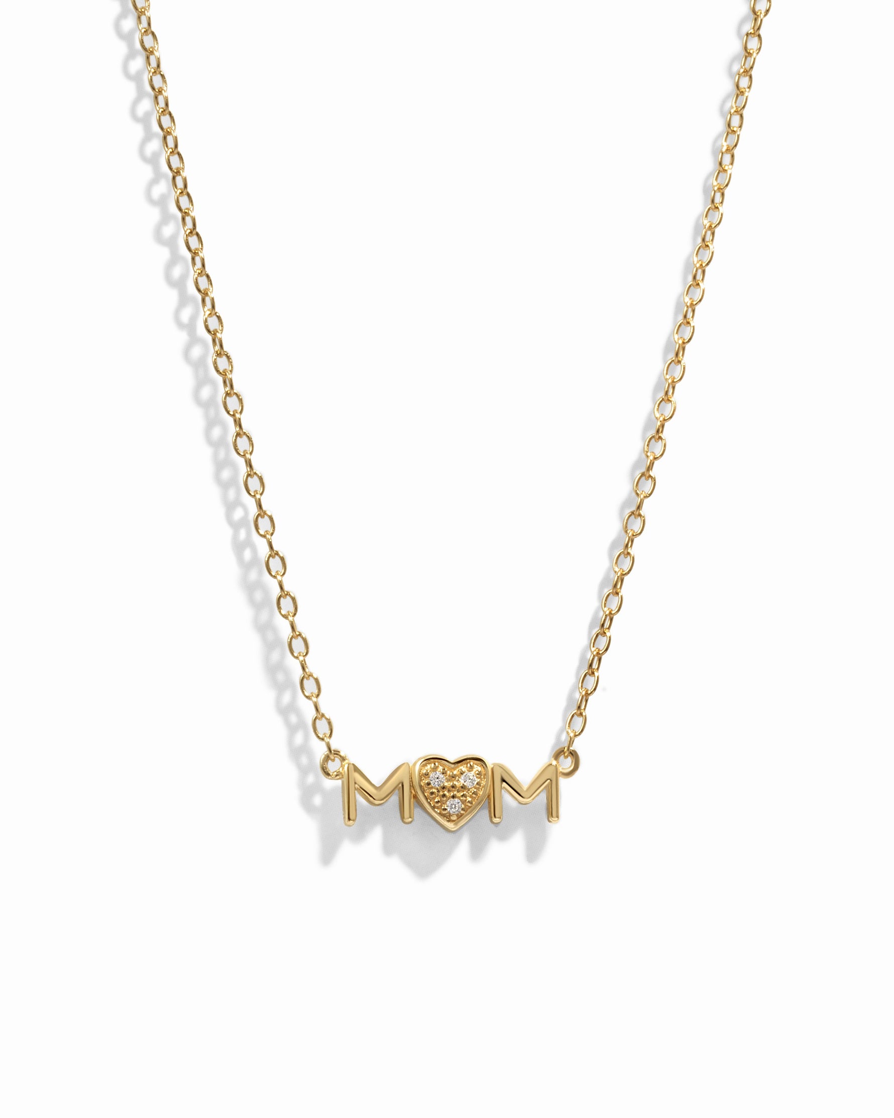 Gold Mom Heart Necklace by Sami Jewels displayed on a white background, showcasing a delicate pendant for mothers.