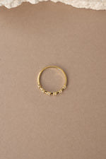 Gold multi-stone diamond ring from Sami Jewels, top view showing colorful gemstones and sparkling design.
