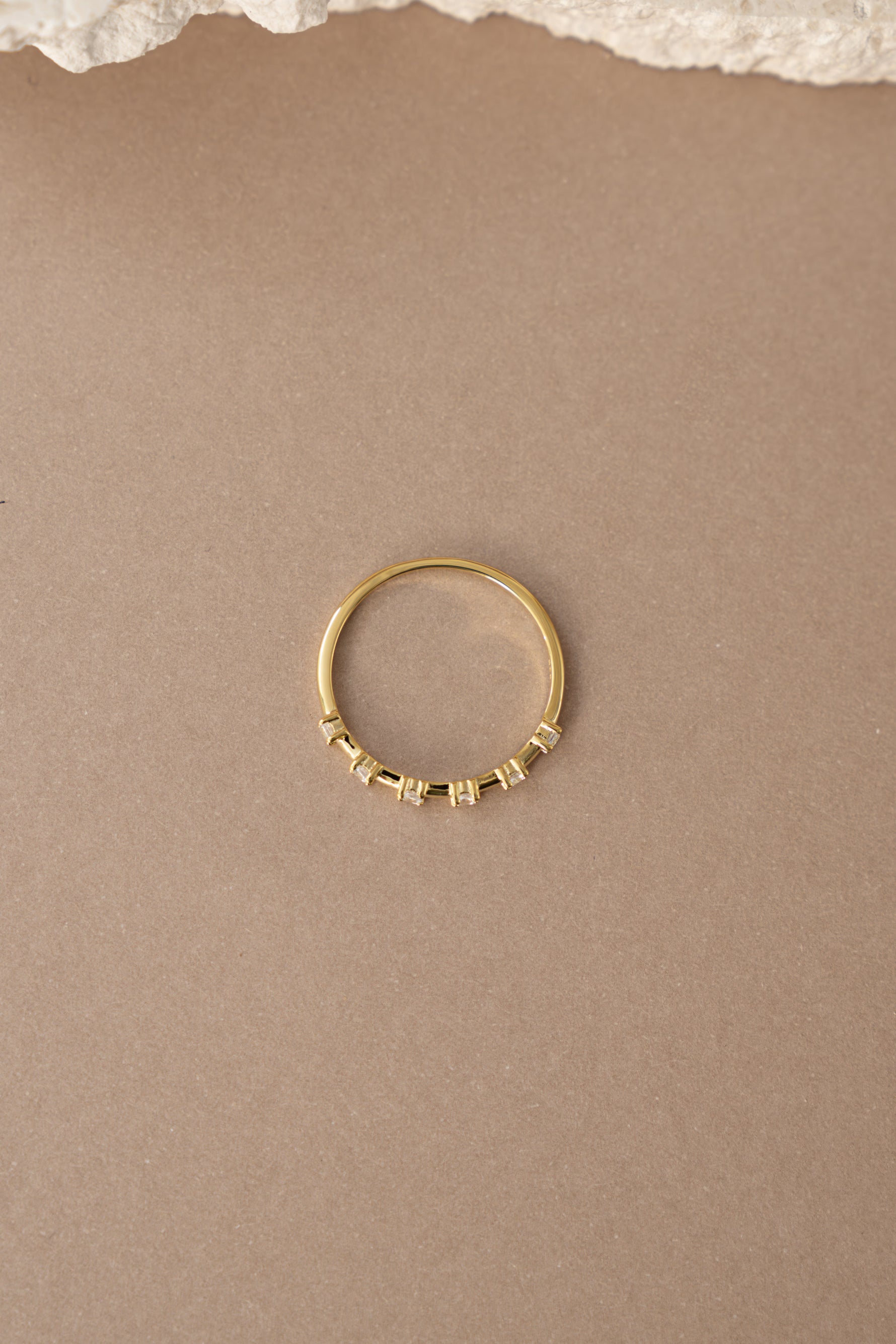 Gold multi-stone diamond ring from Sami Jewels, top view showing colorful gemstones and sparkling design.