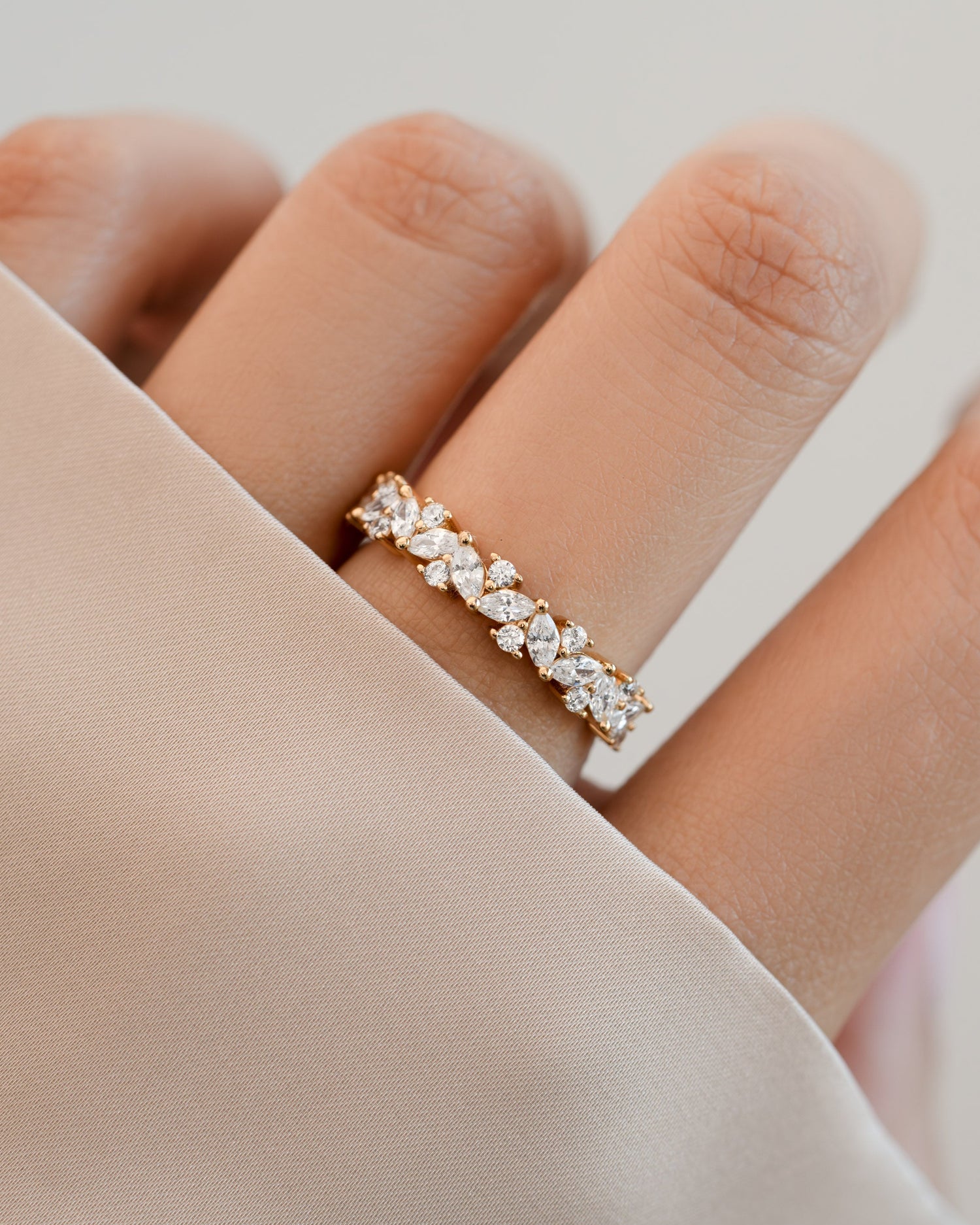 Gold 4mm multi-stone diamond ring by Sami Jewels, showcasing a colorful array of gemstones set in a sleek ring design.