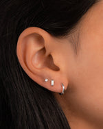 opal baguette stud earring stack n sterling silver on a models ear