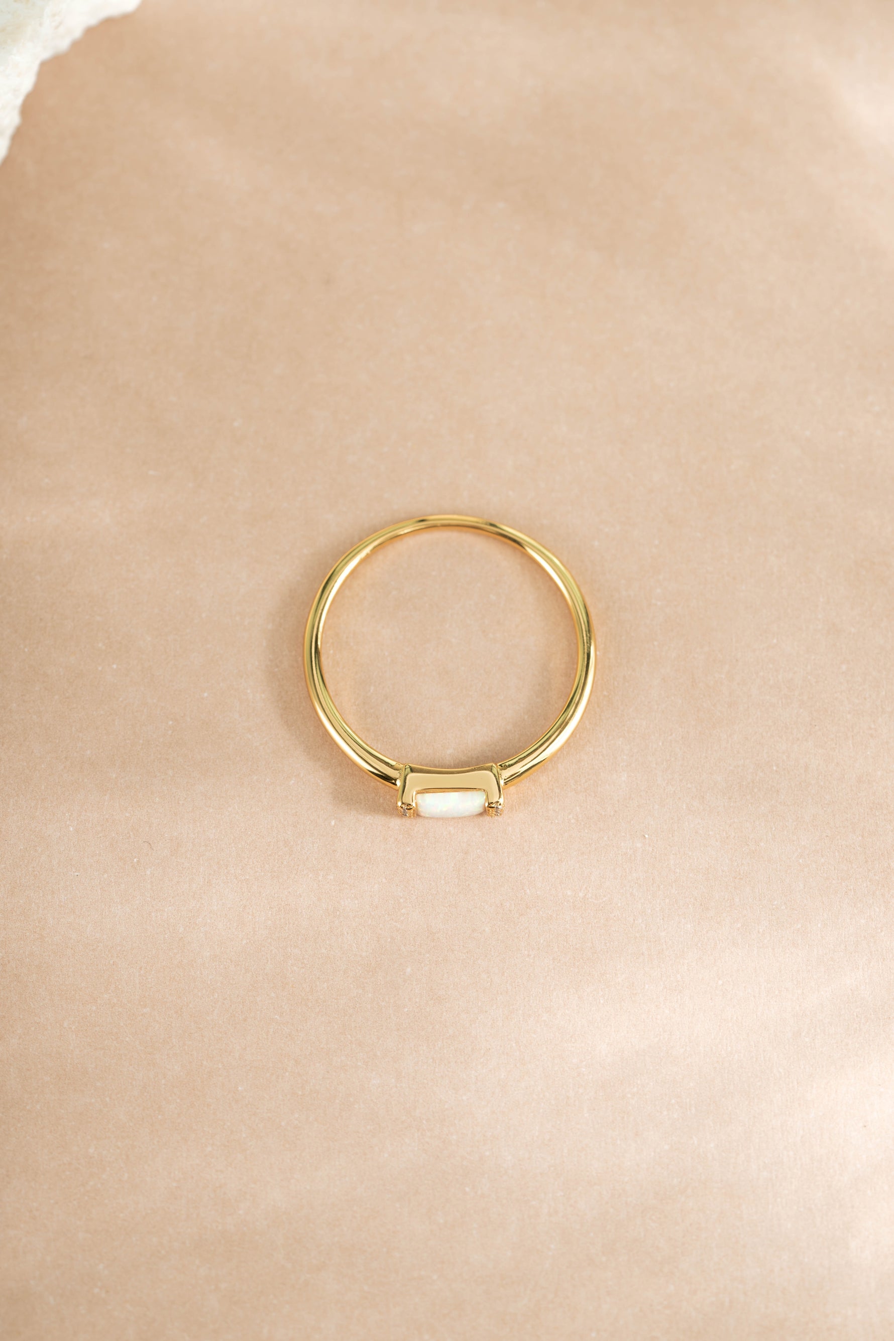 Gold Opal Baguette Ring from Samijewels-527 featuring a striking rectangular opal gemstone set in a sleek gold band.