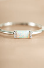 Close-up of Samijewels-527 Opal Baguette Ring in sterling silver showing the detailed opal gemstone and sleek band design.