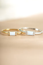 Close-up of a Samijewels sterling silver and gold Opal Baguette Ring showcasing the vibrant opal gemstone and elegant design.