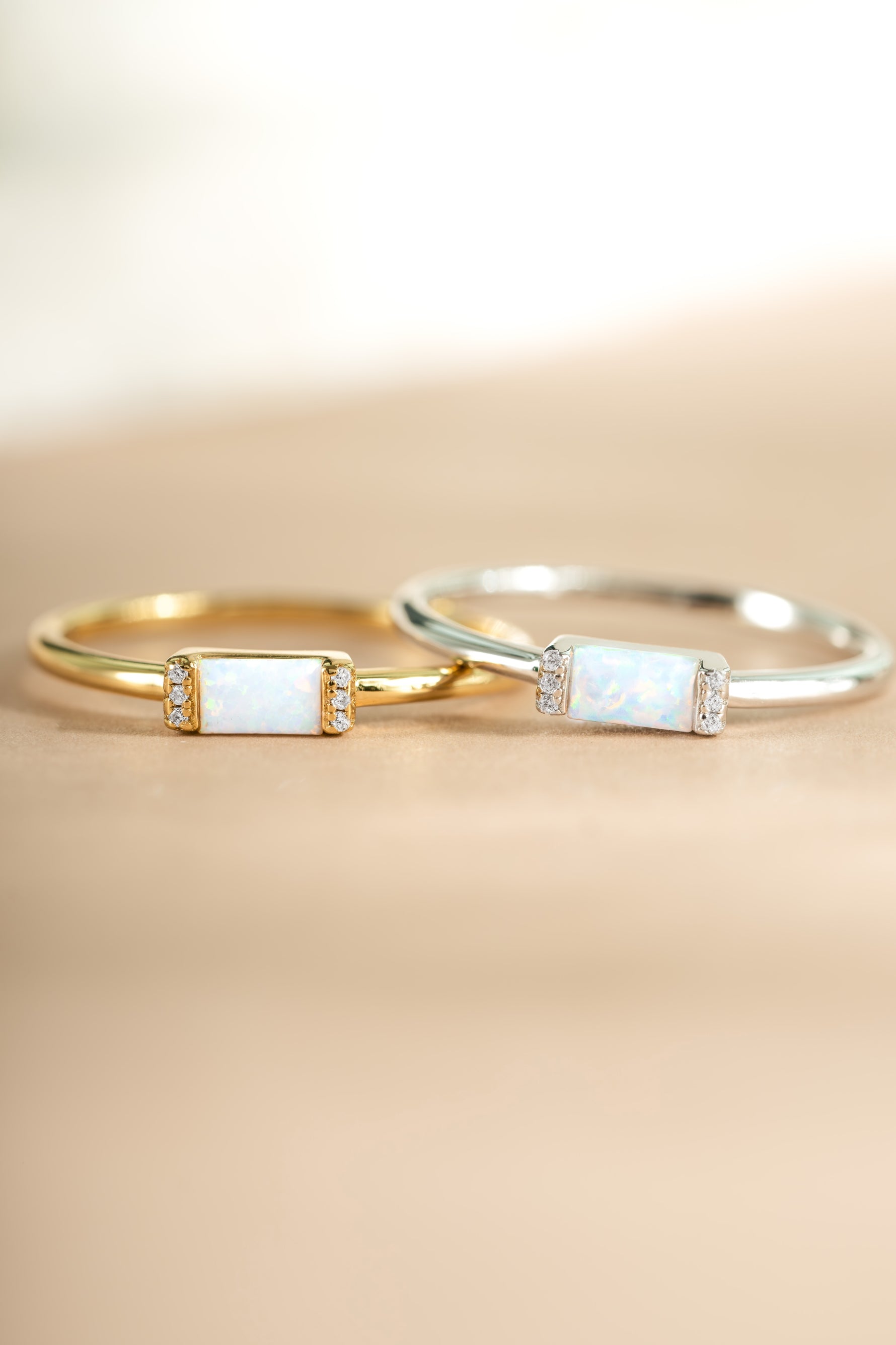 Close-up of a Samijewels sterling silver and gold Opal Baguette Ring showcasing the vibrant opal gemstone and elegant design.