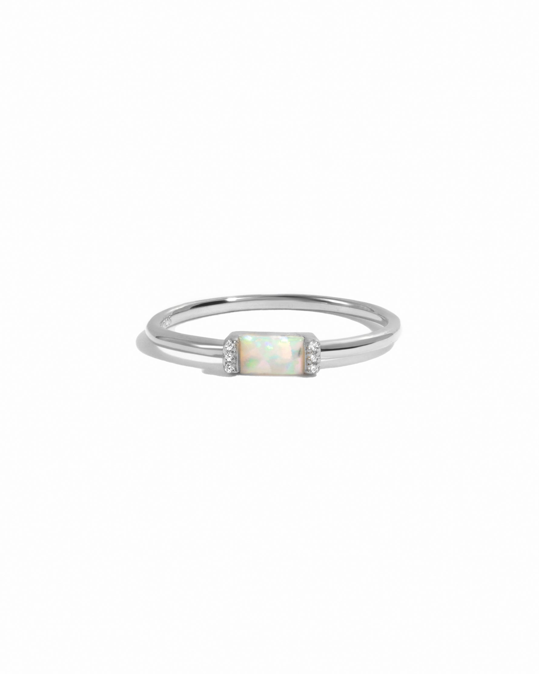 Sterling silver Opal Baguette Ring with a vibrant opal gemstone, elegant design, on a white background.