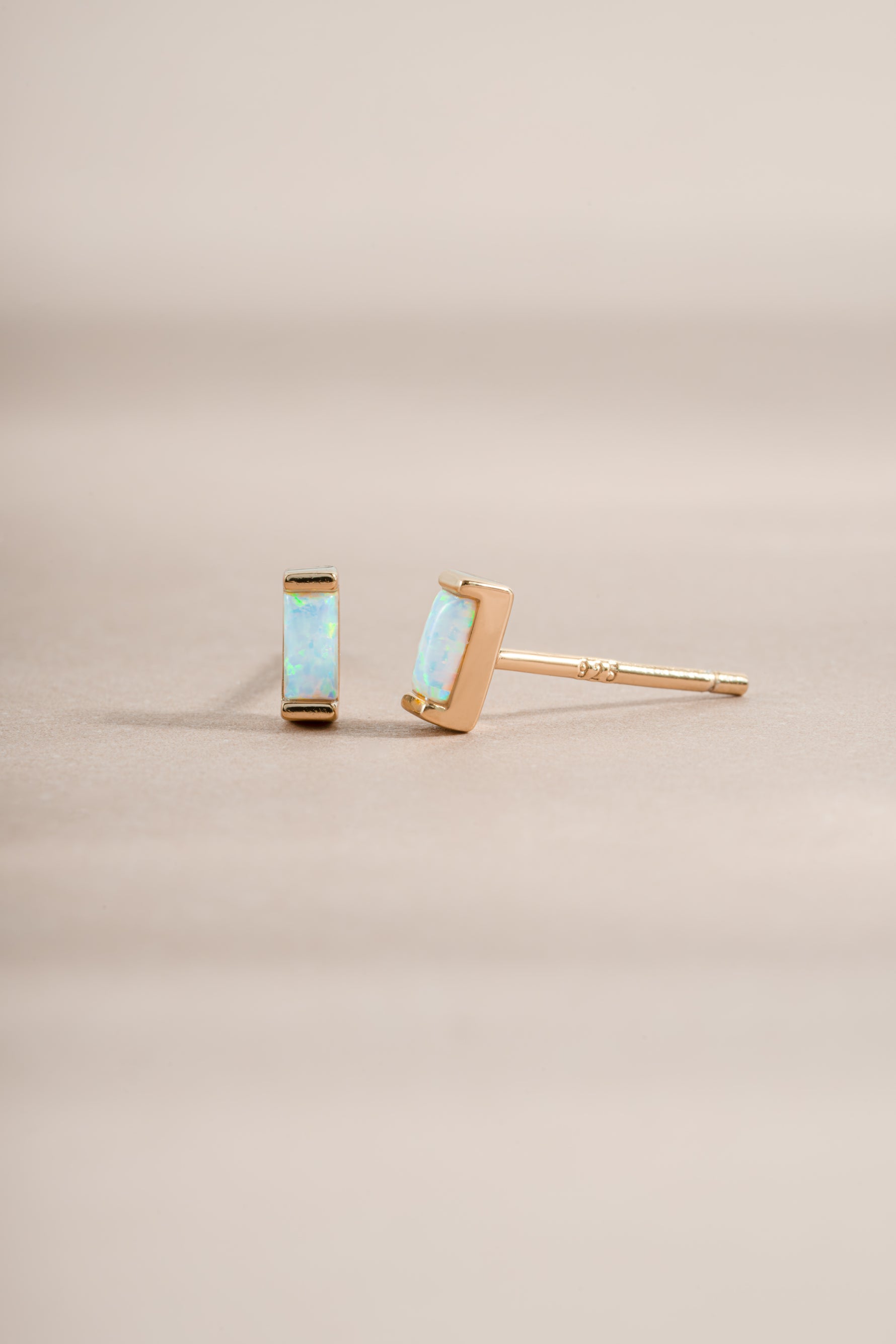 opal baguette studs in gold side view