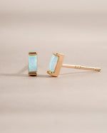 Gold Sami Jewels Opal Baguette Stud Earrings featuring rectangular opal gemstones set in a sleek gold setting.