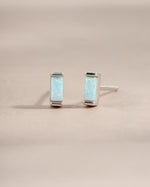 Sterling silver Opal Baguette Stud Earrings by Sami Jewels, front view showcasing sparkling opal baguette gemstones.