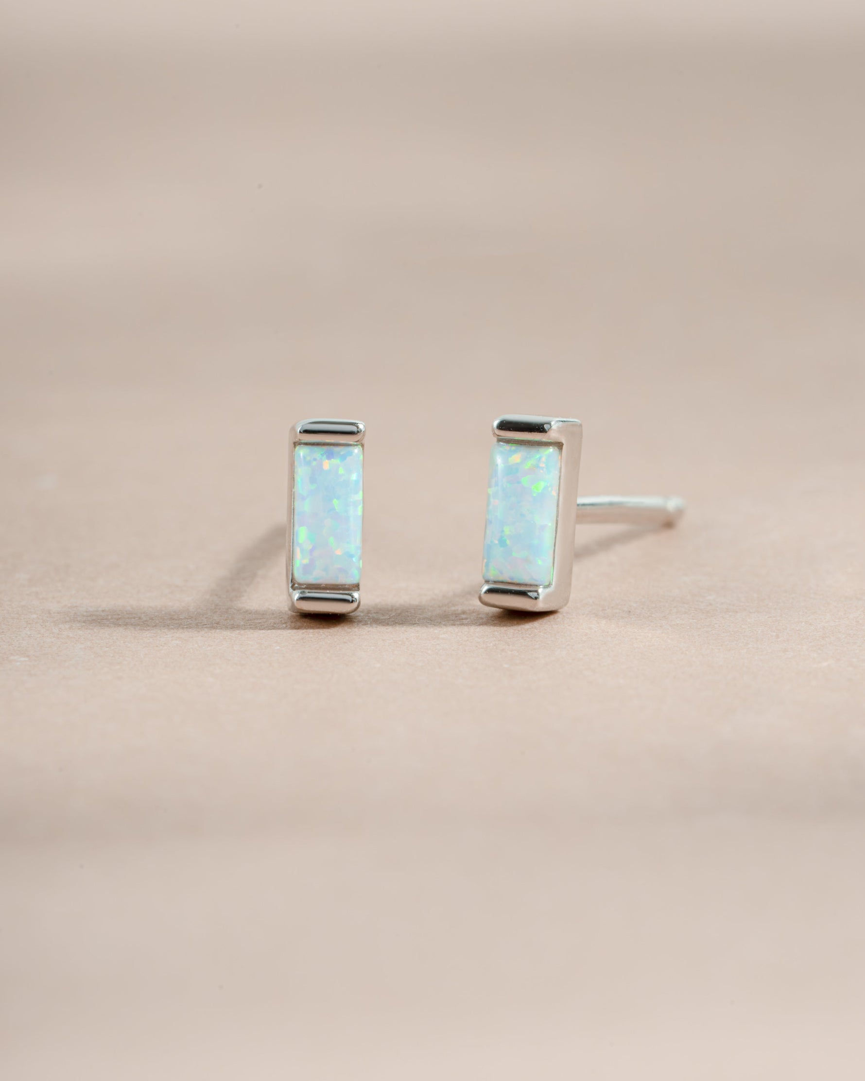 Sterling silver Opal Baguette Stud Earrings by Sami Jewels, front view showcasing sparkling opal baguette gemstones.