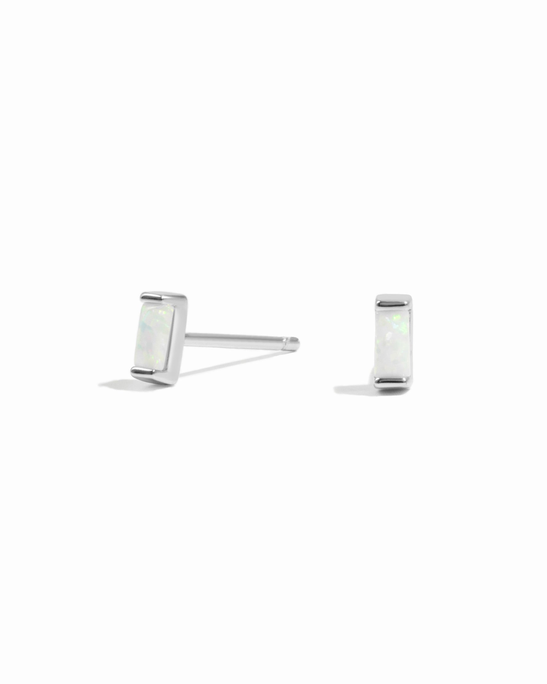 opal baguette studs in sterling silver on white background