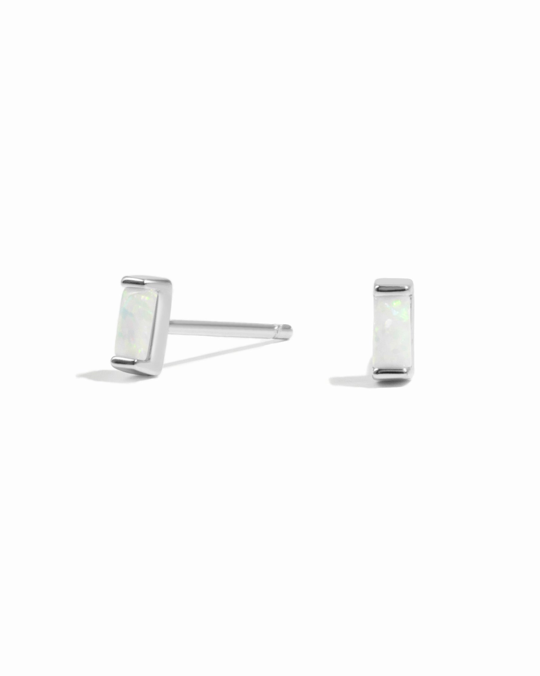 Sterling silver Opal Baguette Stud Earrings by Sami Jewels, featuring white opal gemstones on a clean white background.