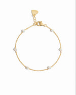 Sami Jewels opal beaded bracelet with white and gold beads on a white background, showcasing elegant jewelry design.