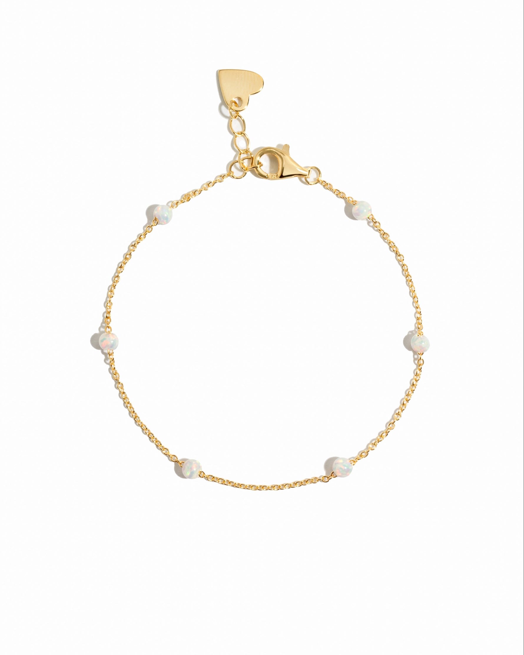 Sami Jewels opal beaded bracelet with white and gold beads on a white background, showcasing elegant jewelry design.